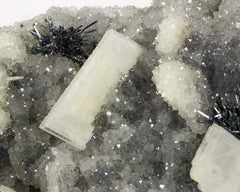 Stibnite on Quartz with Calcite